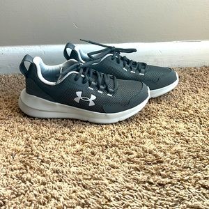 brand new gray and white Under Armour tennis shoes. Boys size 4Y.